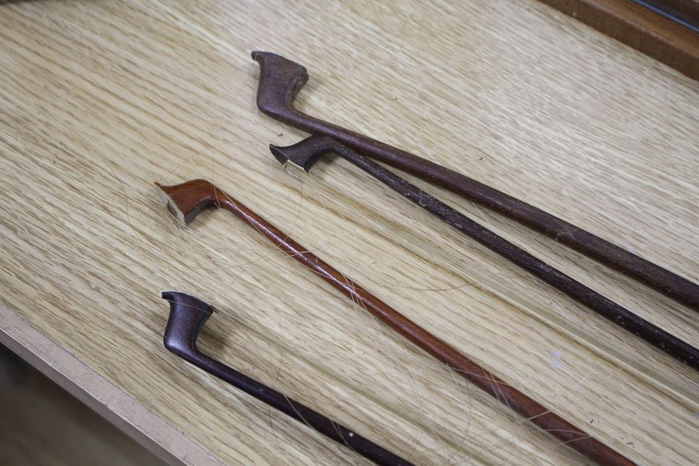 A Chinese violin and four bows